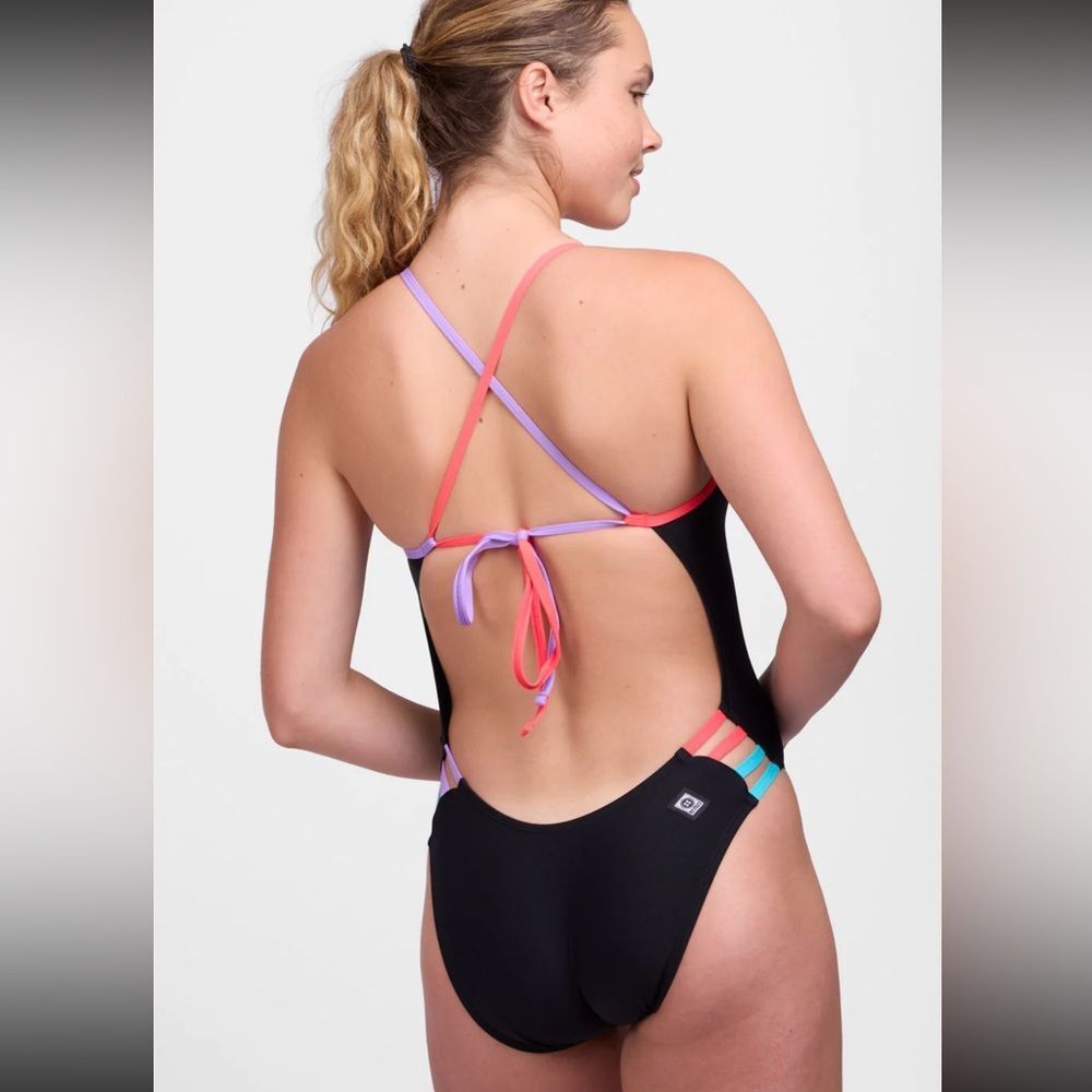 NWT New JOLYN Gavin Tie Back Swimsuit Black Contrast Rainbow Trim Pink Purple 26